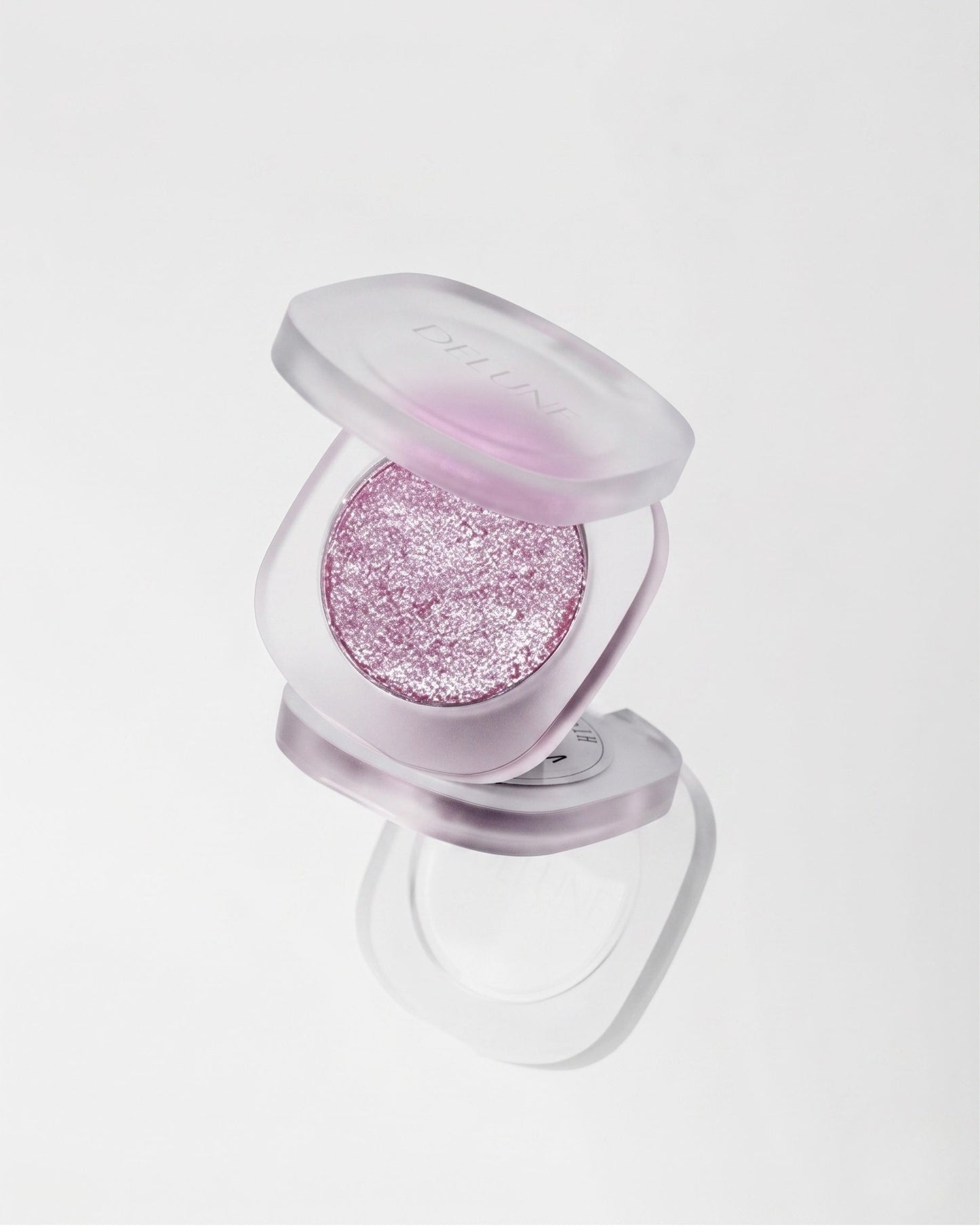 Iluminador em pó compacto