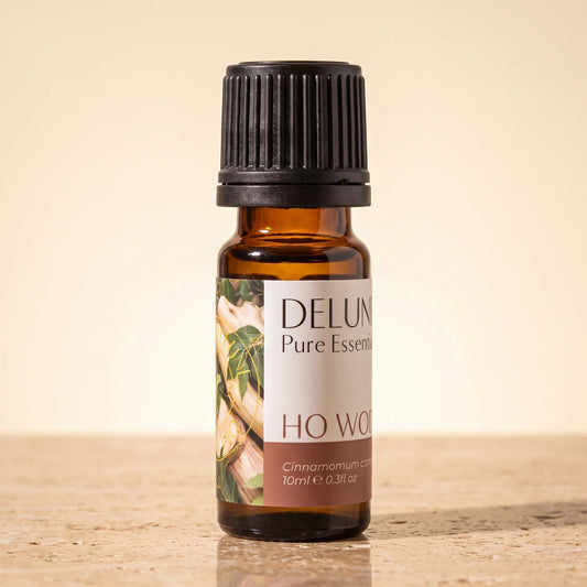 Óleo essencial puro de madeira de ho (ho wood)