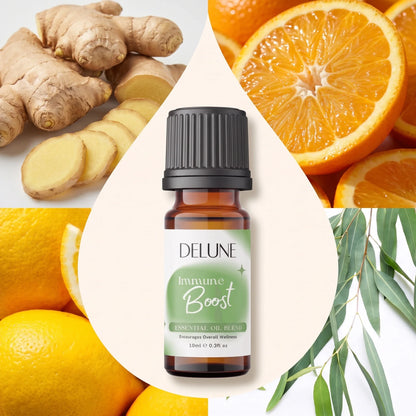 Blend de óleos essenciais Immune Boost Delune cercado pelos ingredientes: gengibre, laranja, limão e eucalipto