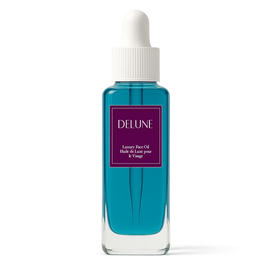 Delune Plum & Blue Tansy Luxury Face Oil bottle with dropper lid, rich in antioxidants and Omegas, promoting radiant, even skin.