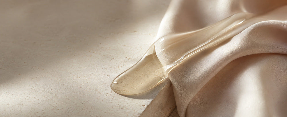 Editorial Pure Squalane silky oil finish on ivory silk and stone